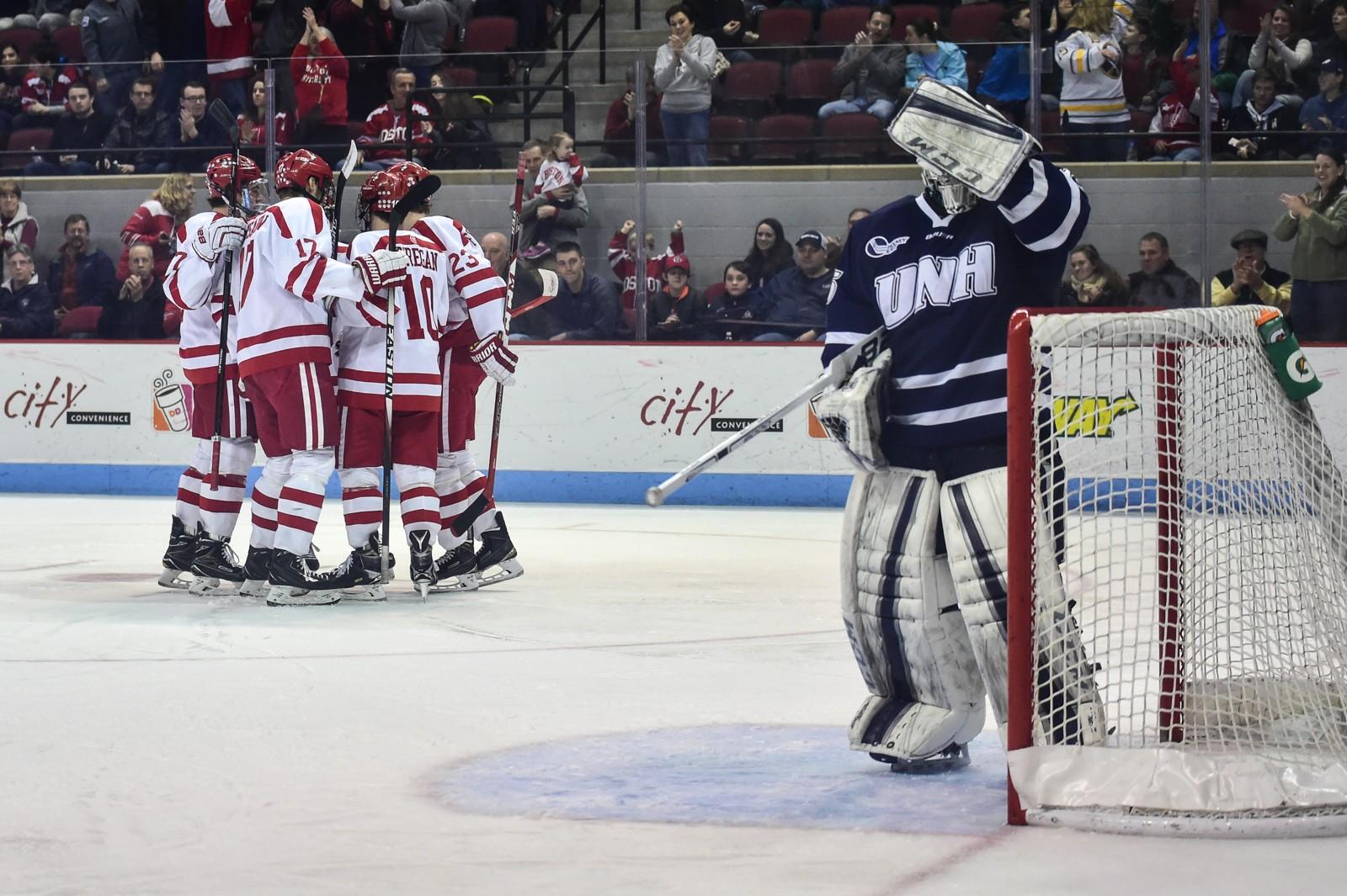 BU celebrates its first of three goals in its win on Saturday night over UNH. PHOTO BY MADDIE MALHOTRA/DAILY FREE PRESS STAFF