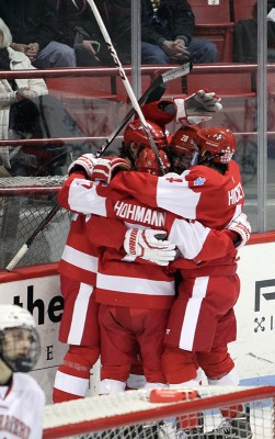 BU celebrates a goal during its 6-1 win over Northeastern. PHOTO BY MAYA DEVEREAUX/DAILY FREE PRESS STAFF