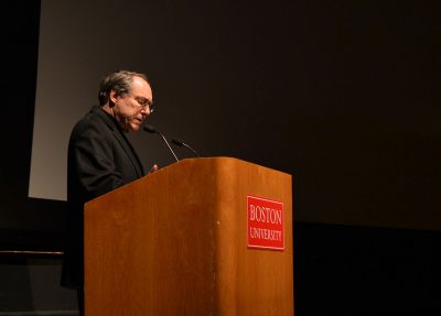 Film and Television Department Chair Paul Schneider introduces the Cinema and Media Production MFA program’s film screening Friday night in the Tsai Performance Center. PHOTO BY CHLOE GRINBERG/ DAILY FREE PRESS STAFF 