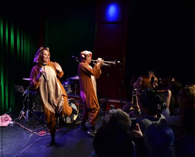 Dressed in a monkey costume, viral YouTube star Tessa Violet performs at The Red Room at Cafe 939 on Oct. 19. PHOTO BY CHLOE GRINBERG/ DAILY FREE PRESS STAFF