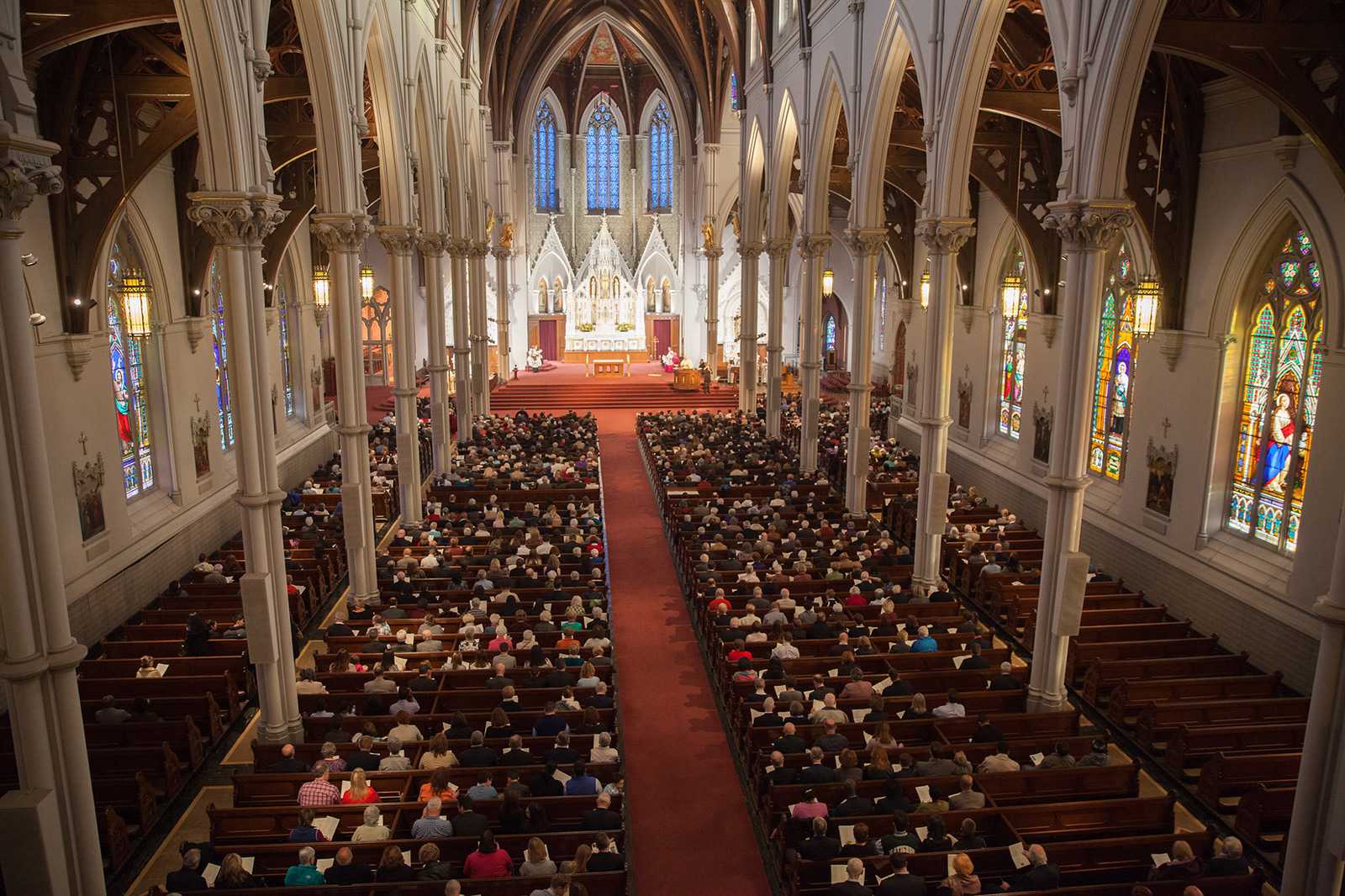 A service in the Cathedral of the Holy Cross in Boston's South End. The Archdiocese of Boston has advised all churches to suspend the traditional handshake during Catholic mass over concerns about the flu and coronavirus. COURTESY OF ROMAN CATHOLIC ARCHDIOCESE OF BOSTON