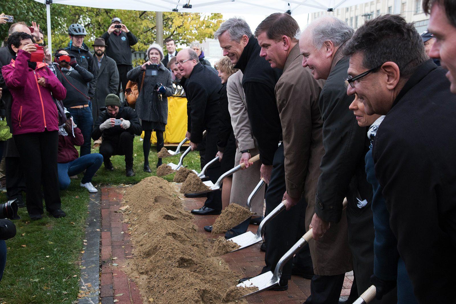 Massachusetts Gov. Charlie Baker and Boston Mayor Martin Walsh join Boston University President Robert Brown and members of the Massachusetts Department of Transportation in a groundbreaking ceremony for protected bike lanes on Commonwealth Avenue. PHOTO BY LAUREN PETERSON/ DAILY FREE PRESS STAFF