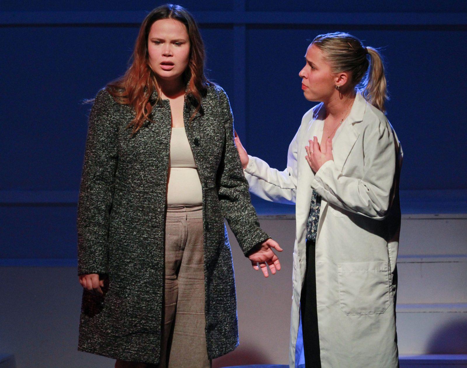 (From left) Diana, played by Lily Kutner, goes to the hospital to talk to Dr. Madden, played by Rose Dubois, to talk about an outburst at home about her son in a production of “Next to Normal” at the Student Theater at Agganis Arena. “Next to Normal” is a Pulitzer Prize-winning Broadway show put on by student organization BU On Broadway. SARAH CRUZ/DFP PHOTOGRAPHER