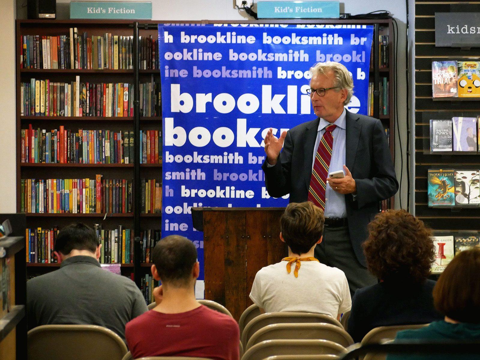 Former Dunkin’ Brands CEO Nigel Travis speaks about his new book, “The Challenge Culture: Why the Most Successful Organizations Run on Pushback” at Brookline Booksmith Thursday. PHOTO BY FELIX PHILLIPS/ DAILY FREE PRESS STAFF