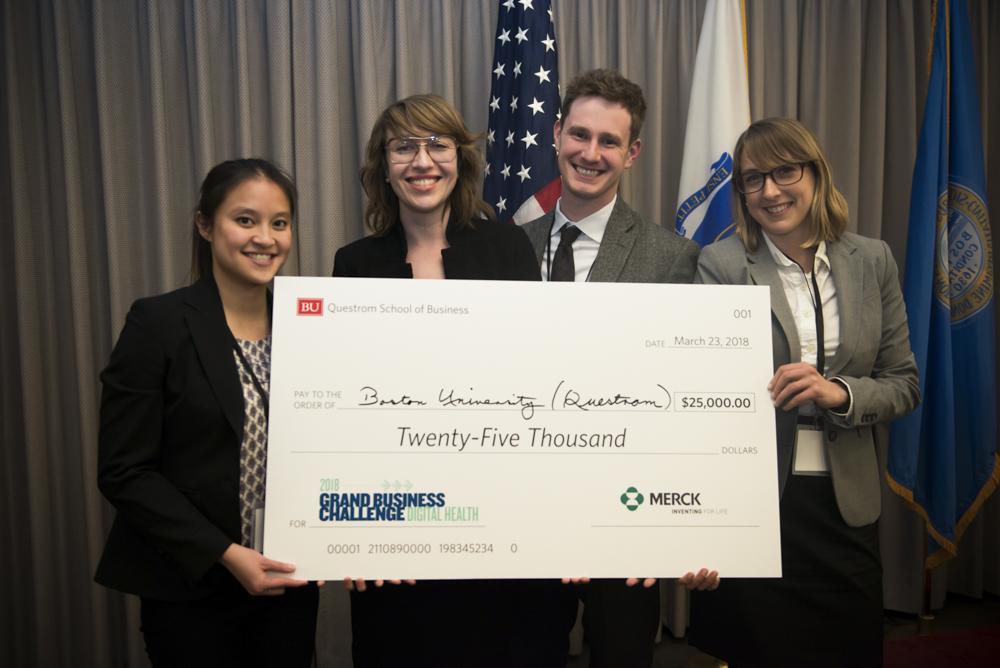 Winners of the Grand Business Challenge, Jillian Luu, Dalia Rinaldi, John Long and Catharine Skulnik. The Grand Business Challenge, an annual competition for Graduate Students in Business, was hosted by the Questrom School of Business this year. PHOTO COURTESY BRAD CZARNOWSKI 

