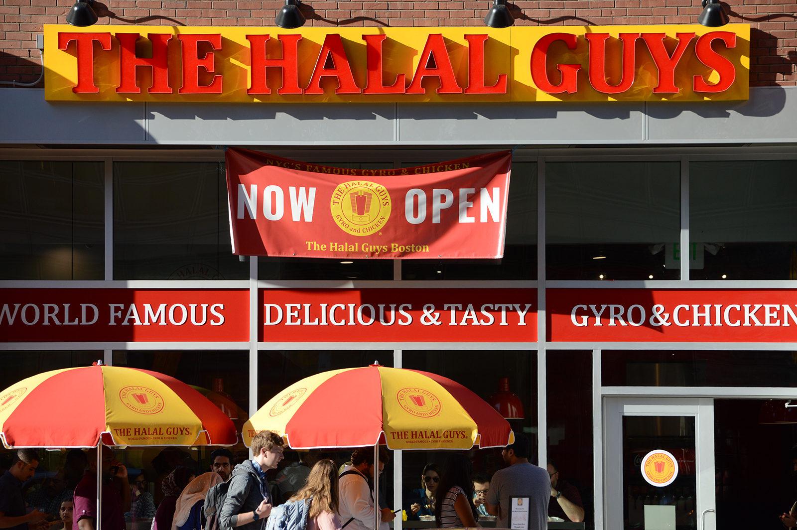 The Halal Guys has its grand opening in Boston at 137 Stuart St. Friday morning, offering free giveaways to the first thousand people at the door. PHOTO BY VIGUNTHAAN THARMARAJAH/ DAILY FREE PRESS STAFF