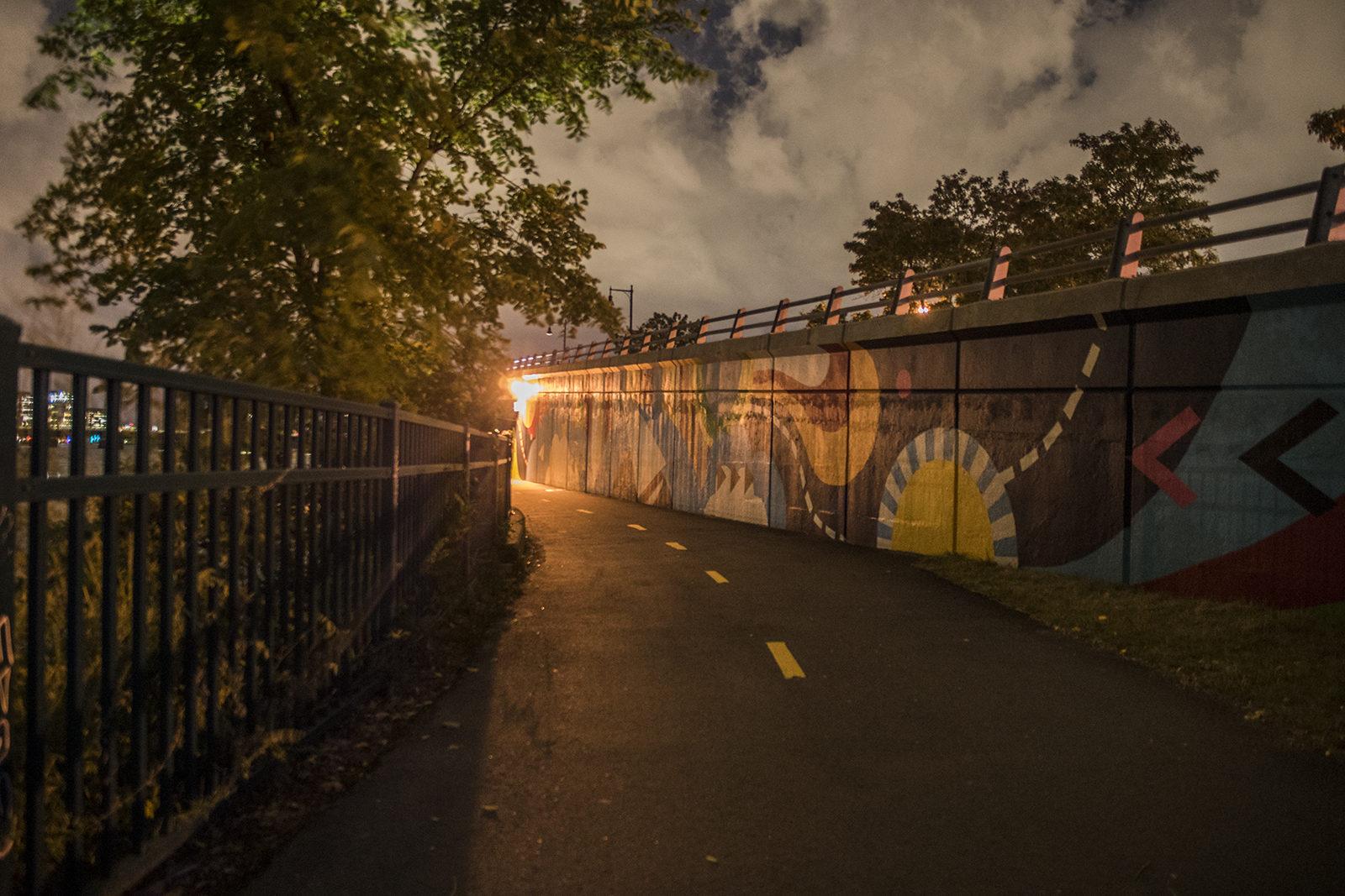 The award-winning, Boston-based artist Silvia Lopez Chavez is commissioned to paint the first public mural on the Esplanade. PHOTO BY CHLOE GRINBERG/ DAILY FREE PRESS STAFF
