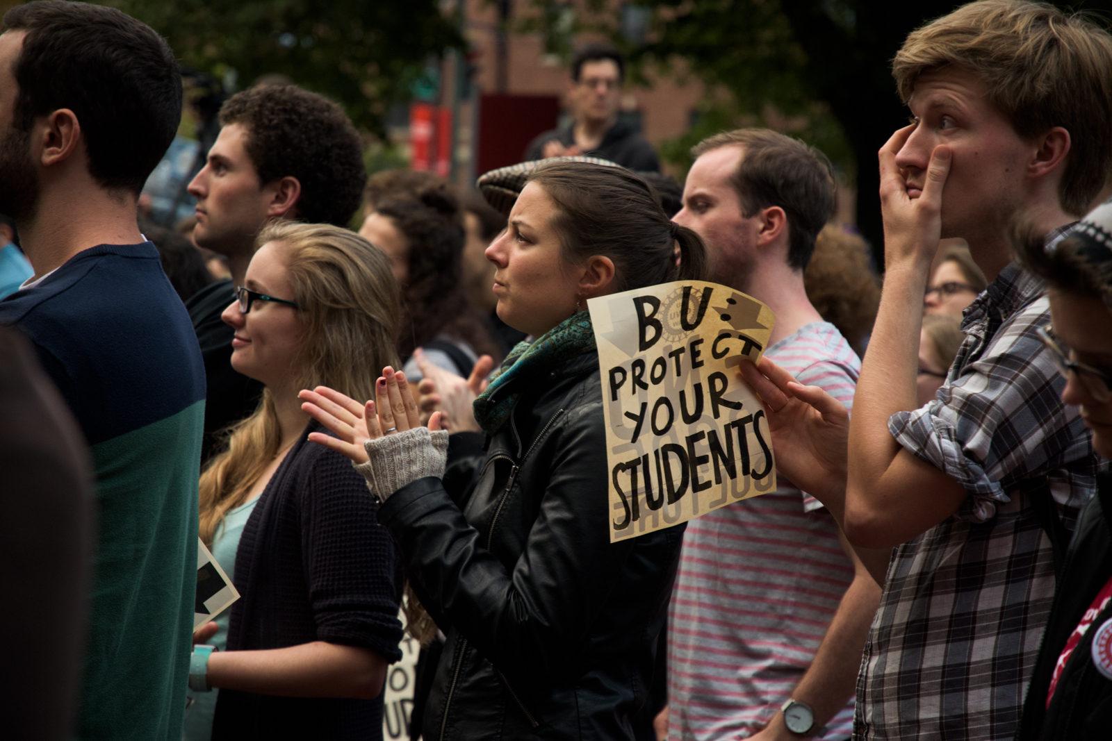 Students rally on Oct. 11 following allegations against Earth and environment professor David Marchant. PHOTO BY CHLOE GRINBERG/ DAILY FREE PRESS STAFF