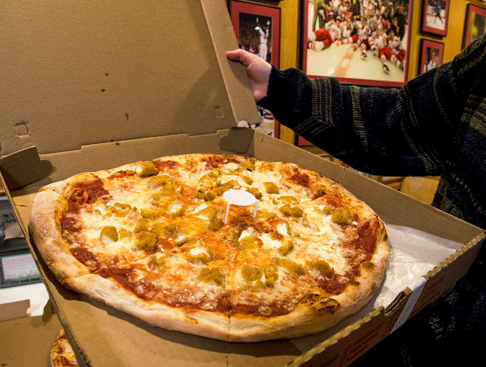 Pizza from T. Anthony’s on Commonwealth Avenue. Due to the COVID-19 pandemic, Boston businesses have had to sacrifice sustainability to build customer confidence and adhere to sanitation guidelines. PHOTO BY CHLOE GRINBERG/ DFP FILE