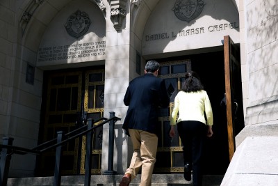 Attendees enter Marsh Chapel Sunday for a memorial service for Daryl Carr, a Graduate School of Arts and Sciences student who died in February. PHOTO BY BRIAN SONG/DAILY FREE PRESS STAFF