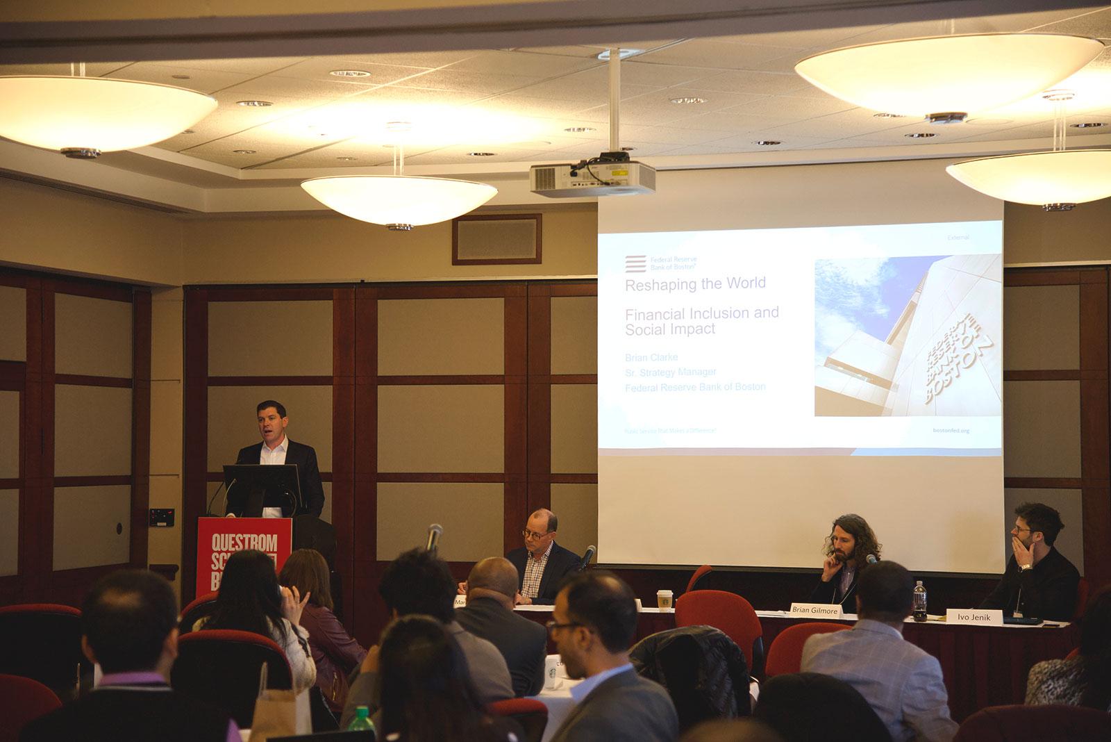 Brian Clarke, a senior strategy manager at the Federal Reserve Bank of Boston, speaks at the Reshaping the World Conference hosted by Boston University’s Questrom School of Business Thursday. DANIEL MU/ DAILY FREE PRESS STAFF