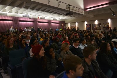 The audience watches the debate between Nicholas Fuentes (CAS '20) and Jake Brewer (CAS '17) Sunday night in the GSU Conference Auditorium. PHOTO BY SHANE FU/ DAILY FREE PRESS STAFF