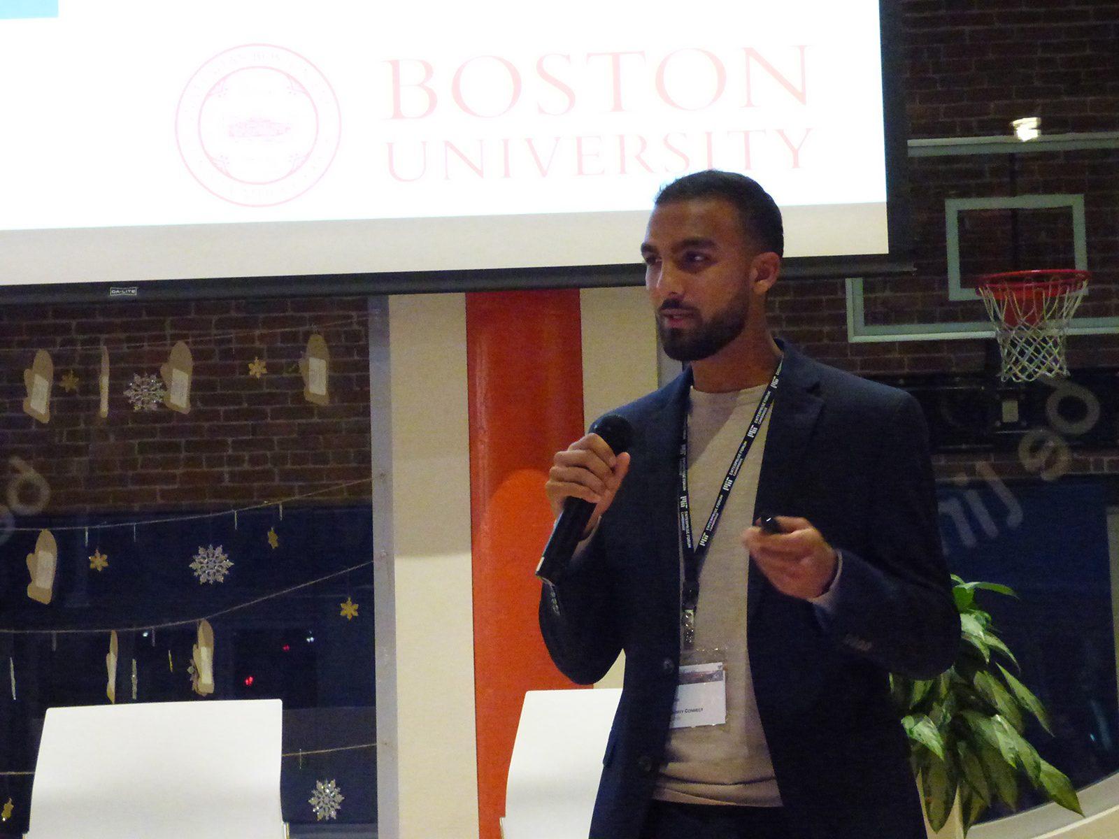 Nevil Desai, a senior in Boston University’s Sargent College of Health and Rehabilitation Sciences, pitches Community Connect, an app he co-founded, at the 2019 Beantown Throwdown at Logmein Boston Headquarters Tuesday evening. COURTESY AMY GOGGINS