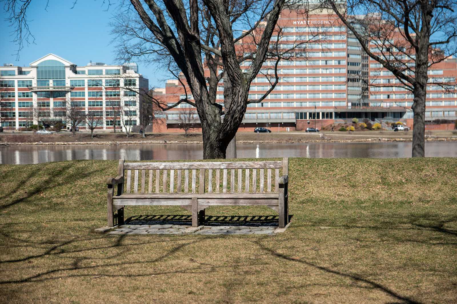 An empty bench on the Boston University Beach. Public health officials have emphasized the importance of social distancing in the wake of the coronavirus to prevent the virus’ spread and minimize the burden on the healthcare system. LAURYN ALLEN/ DAILY FREE PRESS STAFF