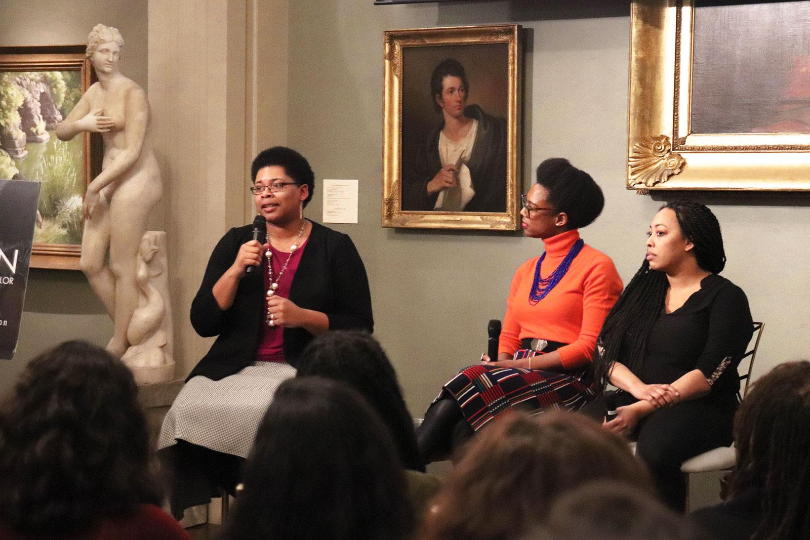 Catherine Morris, Courtney Sharpe and Lyndsay Allyn Cox speak at the EmpowerHER panel on making Boston’s cultural scene more inclusive to black female artists at the Boston Athenæum Wednesday. PERRY SOSI/ DAILY FREE PRESS STAFF