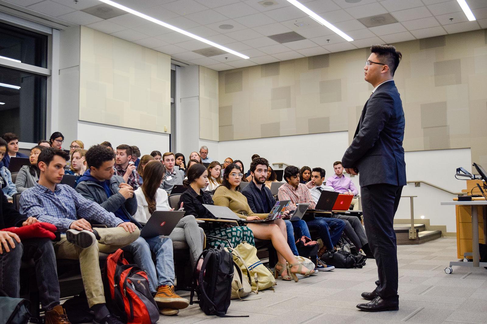 Boston University College of Communications Senator Yitong Liu delivers his presentation on the Infectious Diseases Prevention Act to the Student Government Senate Monday. SOPHIA FLISSLER/ DAILY FREE PRESS STAFF