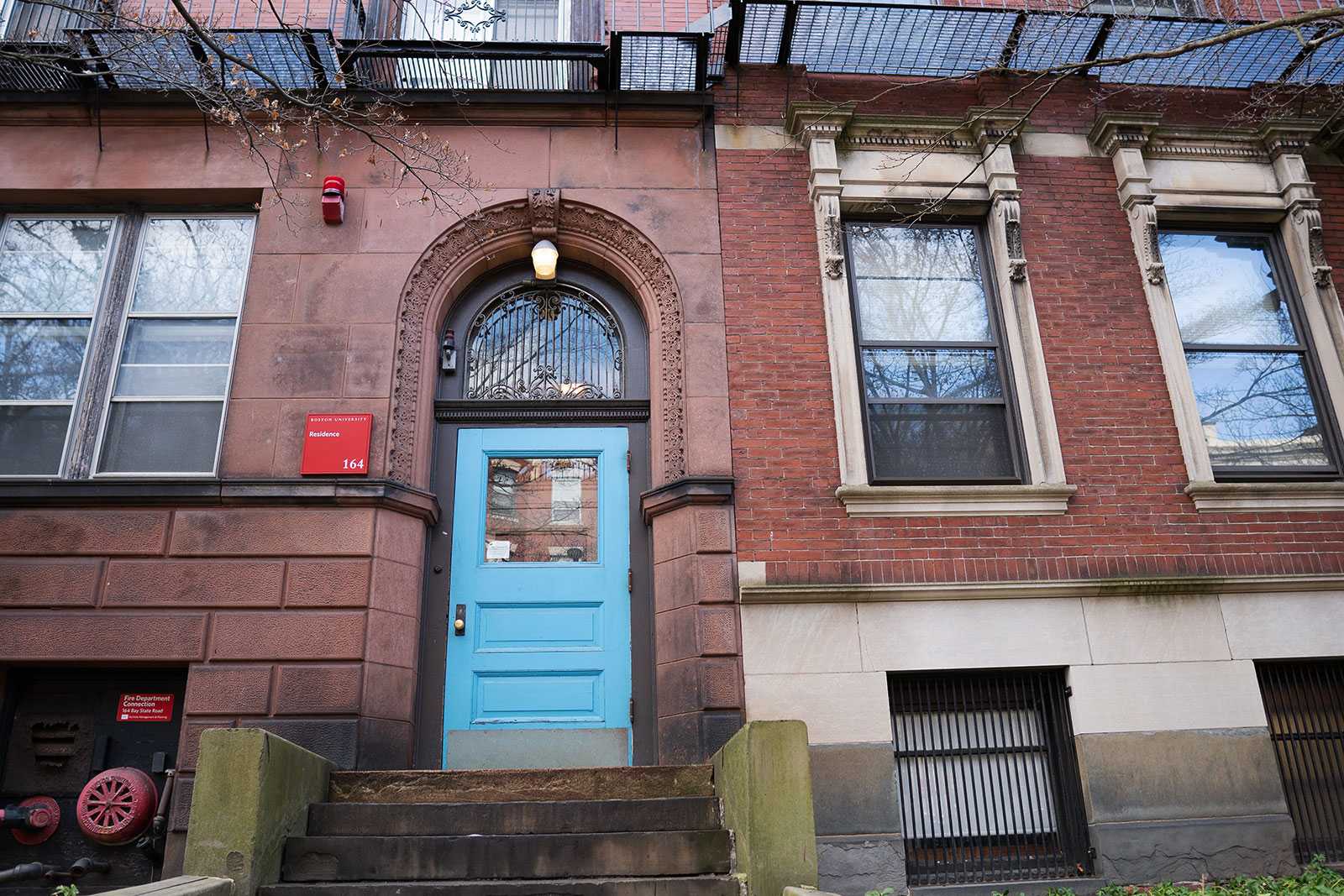 A Boston University residence on Bay State Road. Nearly 1,000 BU students remain on campus, many of whom cannot return home because of travel restrictions or fears they could transmit the coronavirus to vulnerable family members. SOPHIE PARK/ DFP FILE