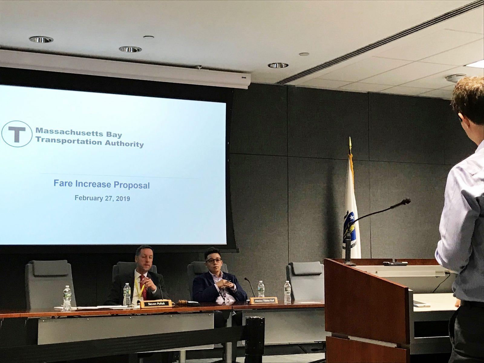 The MBTA held a public meeting with a crowd of more than 100 people at the State Transportation building in downtown to oppose fare hikes Wednesday. EVELYN BERGMAN/ DAILY FREE PRESS STAFF