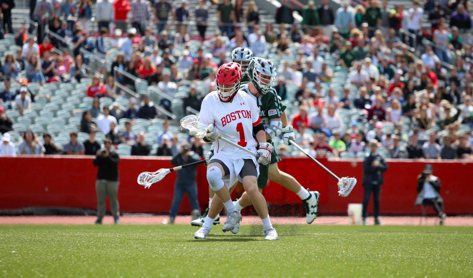 Sophomore midfielder Sean Christman in an April 13 game against Loyola University Maryland. Christman is 175-124 in faceoffs this season. MADISON EPPERSON/ DFP STAFF
