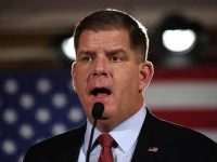 marty walsh speaking into a microphone