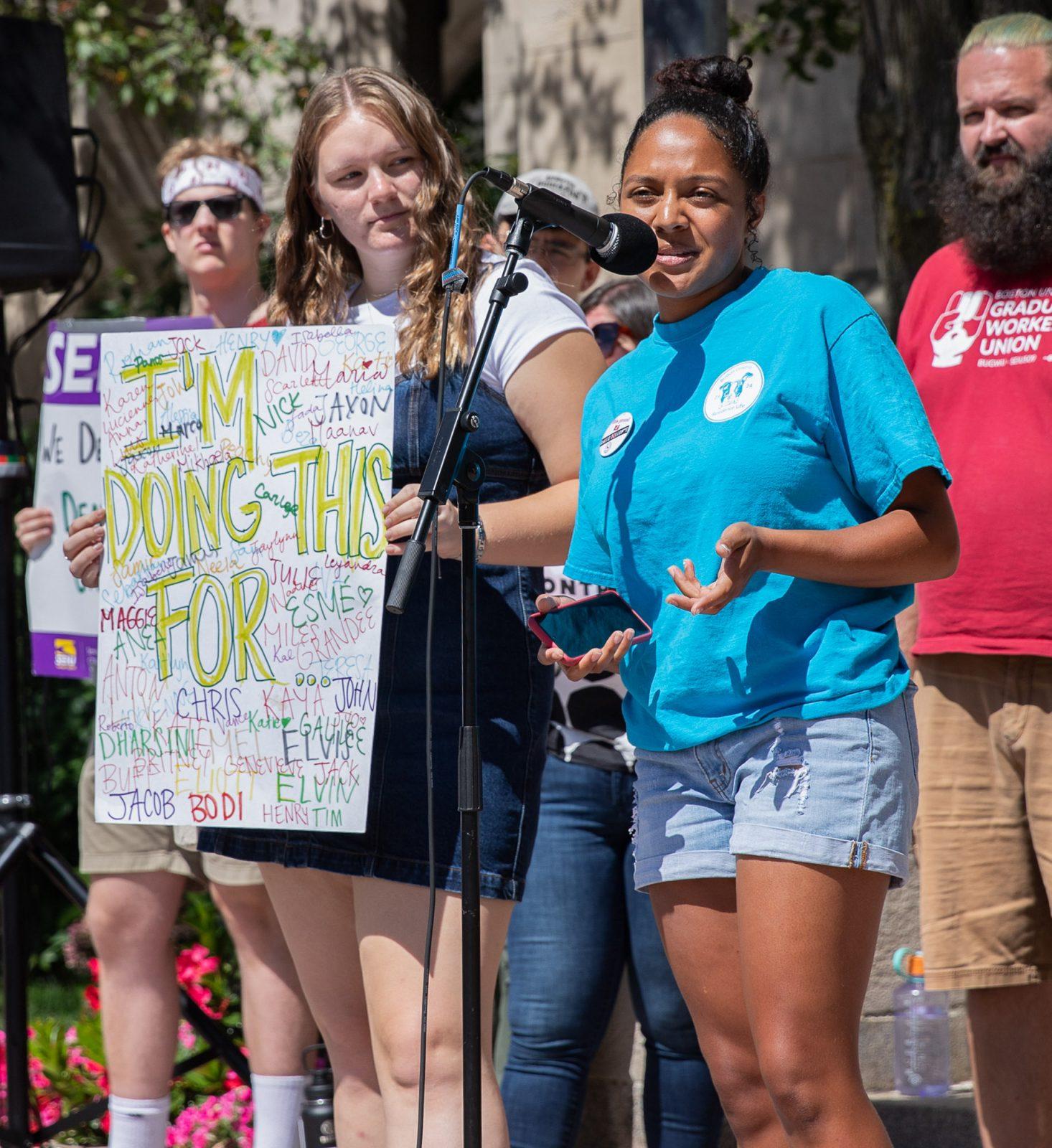 Resident Assistant Melissa Taylor gives a speech during the Graduate Workers Union walkout on Sept. 3. Boston University and the ResLife Union reached a tentative agreement during the bargaining session on Tuesday. KATE KOTLYAR/DFP PHOTOGRAPHER