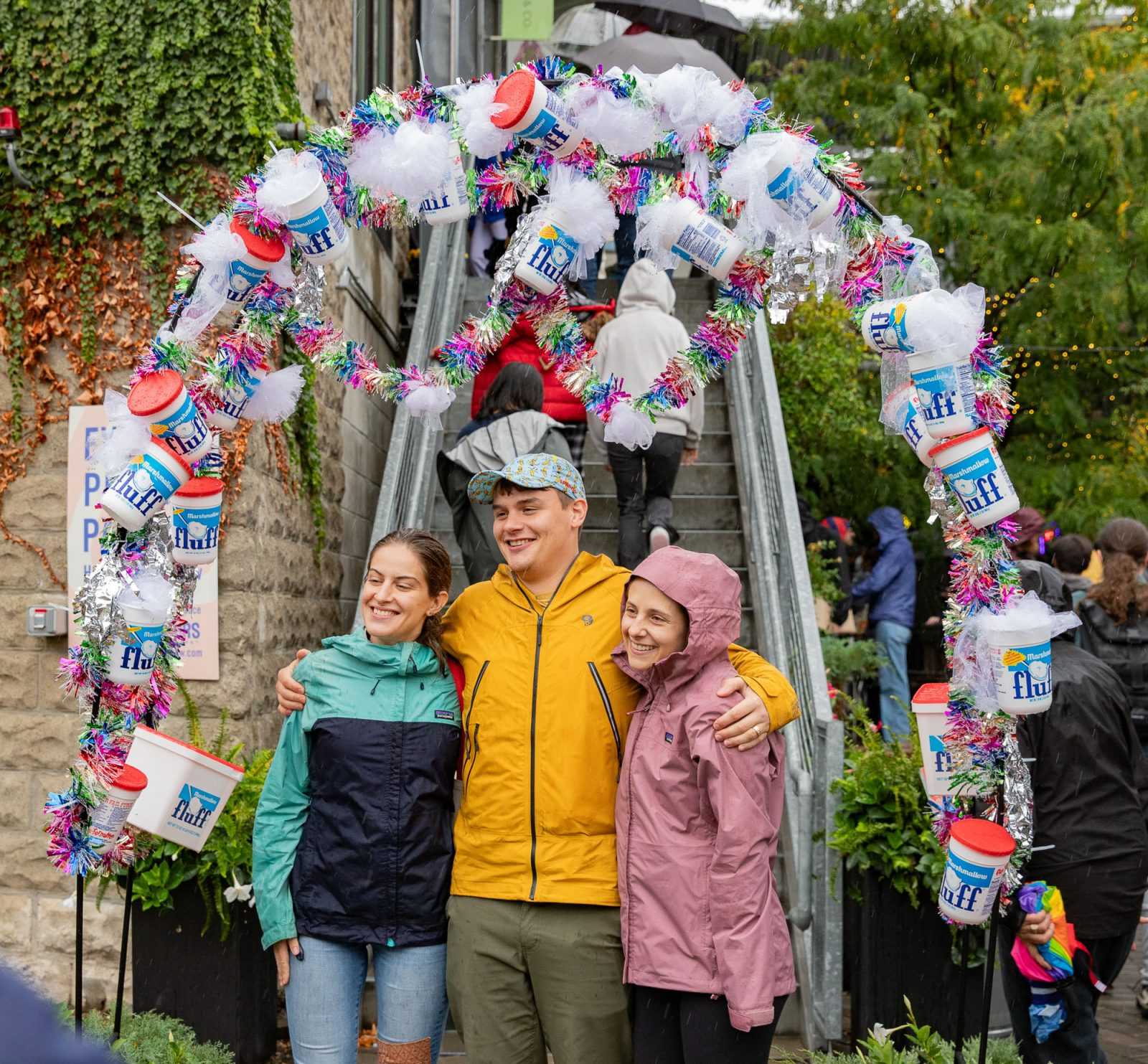 People take a picture under the Marshmallow Fluff archway in Bow Market. KATE KOTLYAR/DFP PHOTOGRAPHER