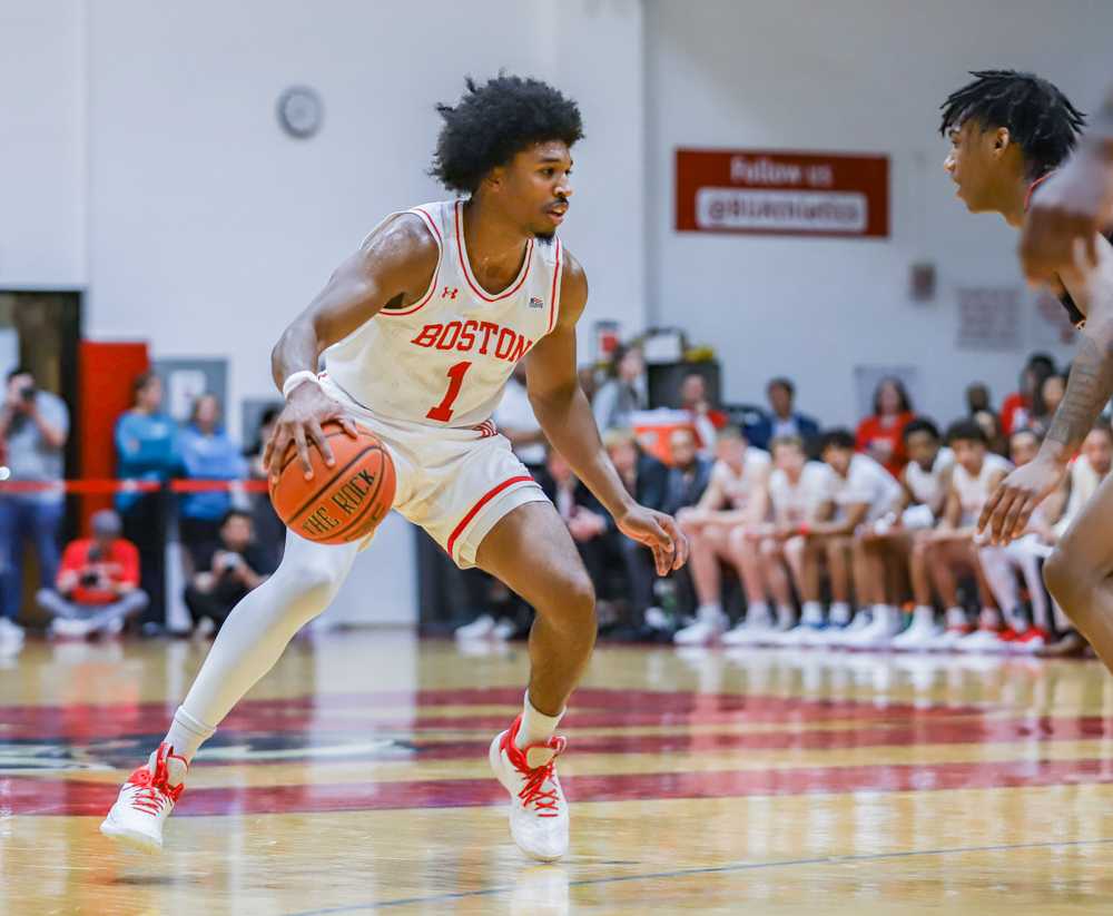 Senior guard Ethan Okwuosa (1) dribbles the ball and drives to the hoop at a game against Northeastern University on Nov. 4. The Boston University men’s basketball team lost to The University of California Los Angeles Monday night. KATE KOTLYAR/ DFP PHOTOGRAPHER. 