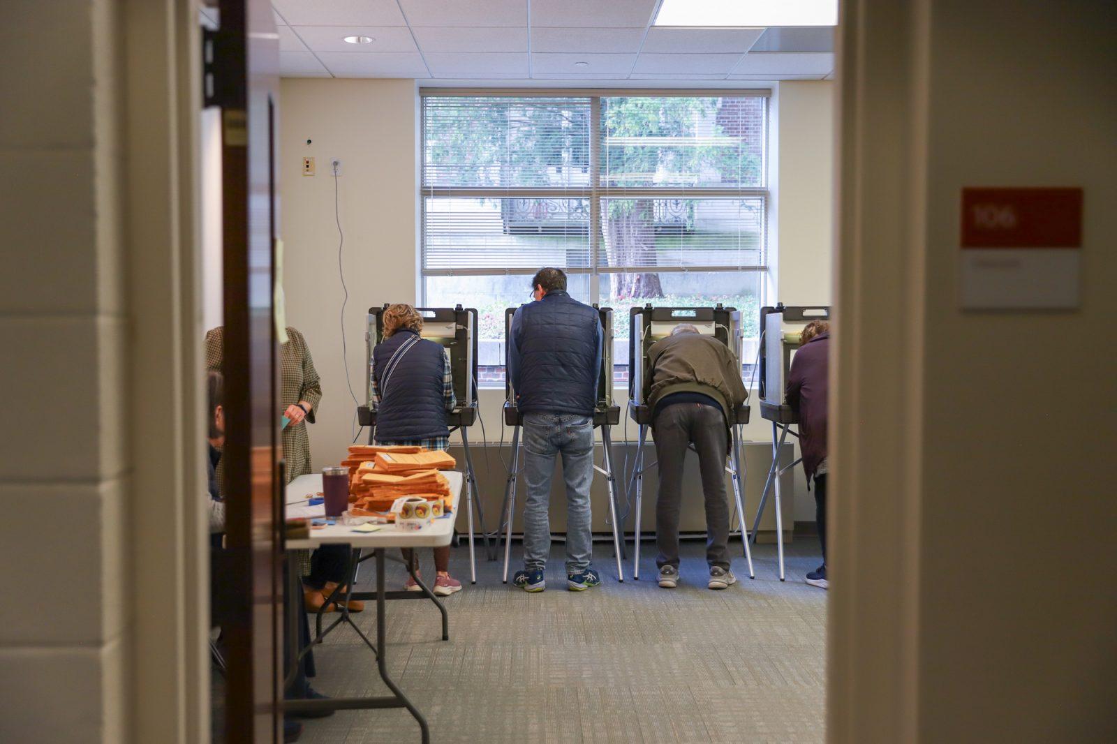 Voters fill out their ballots on Nov. 5 at Precinct 1 in Brookline, Massachusetts. KATE KOTLYAR/DFP PHOTOGRAPHER