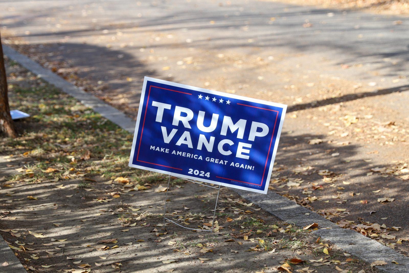 A Trump-Vance sign in Brookline, Massachusetts. While President-elect Donald Trump plans to make changes to reproductive, healthcare, education and immigration policies, Boston’s policies maintain protections. KATE KOTLYAR/DFP PHOTOGRAPHER