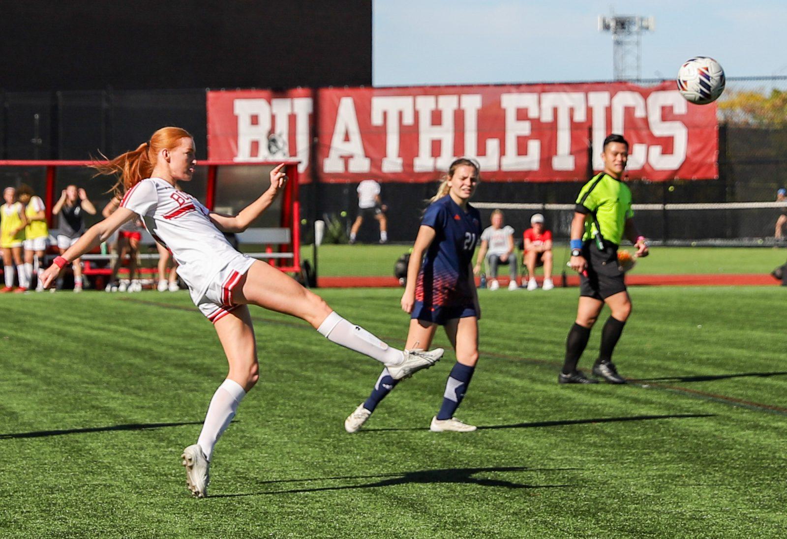 Sophomore midfielder Ciara Kennedy (5) kicks the ball down the field. The Boston University women’s soccer team earned its second consecutive shutout win with their 1-0 defeat of Bucknell University on Sunday. KATE KOTLYAR/DFP PHOTOGRAPHER 
