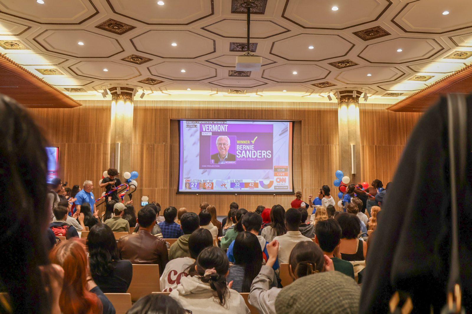 Boston University students watch the election at the Howard Thurman Center on Tuesday. Election watch parties were hosted by BU Student Government, BU College Democrats and the Community Service Center at HTC and also by the Faculty in Residence at Warren Towers. MEGAN KWAN/DFP PHOTOGRAPHER