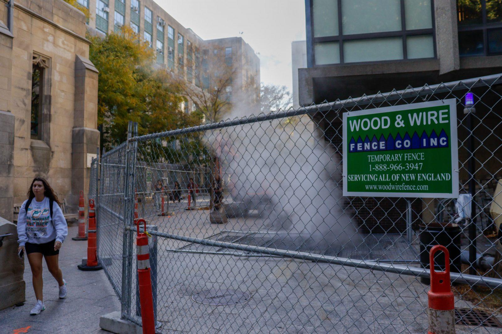 A smoking manhole behind Marsh Chapel. An underground pipe leak is causing steam to release through manholes behind Marsh Chapel. LAUREN ALBANO/DFP PHOTOGRAPHER