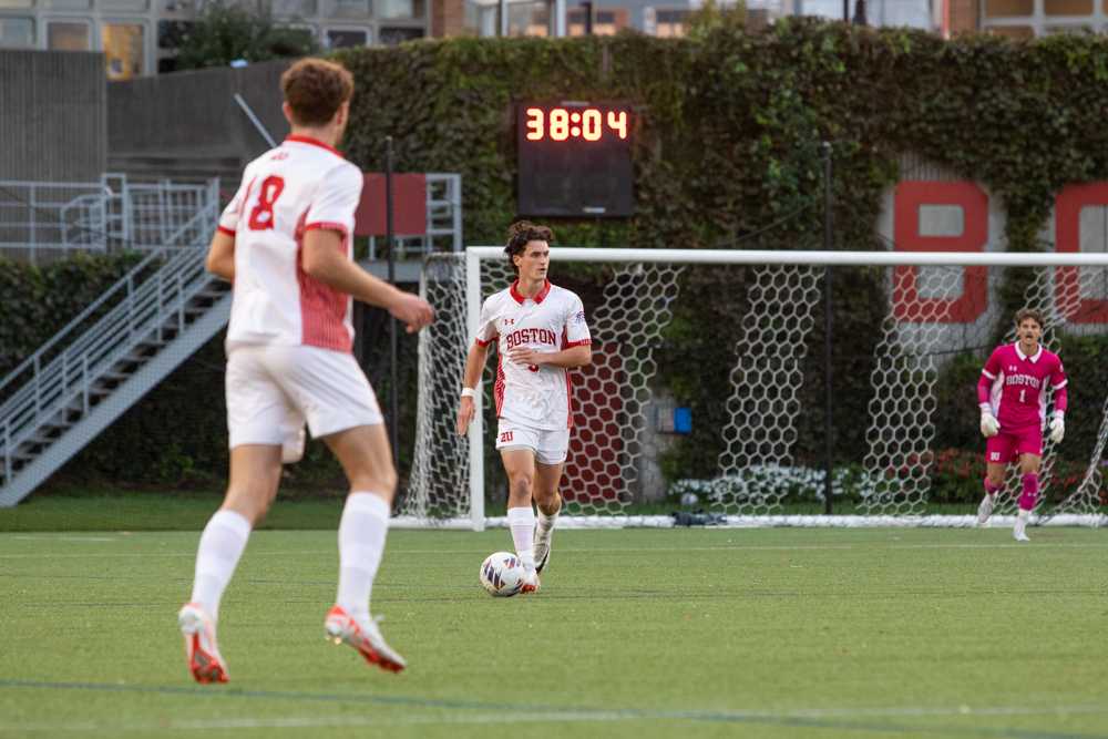Boston University senior back Griffin Roach (5) during a game against Holy Cross at Nickerson Field in September. The Terriers tied against Harvard 1-1 on Tuesday. HALEY ALVAREZ-LAUTO/DFP PHOTOGRAPHER