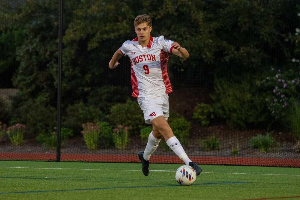 Alex Bonnington plays in a match against the College of the Holy Cross on Wednesday