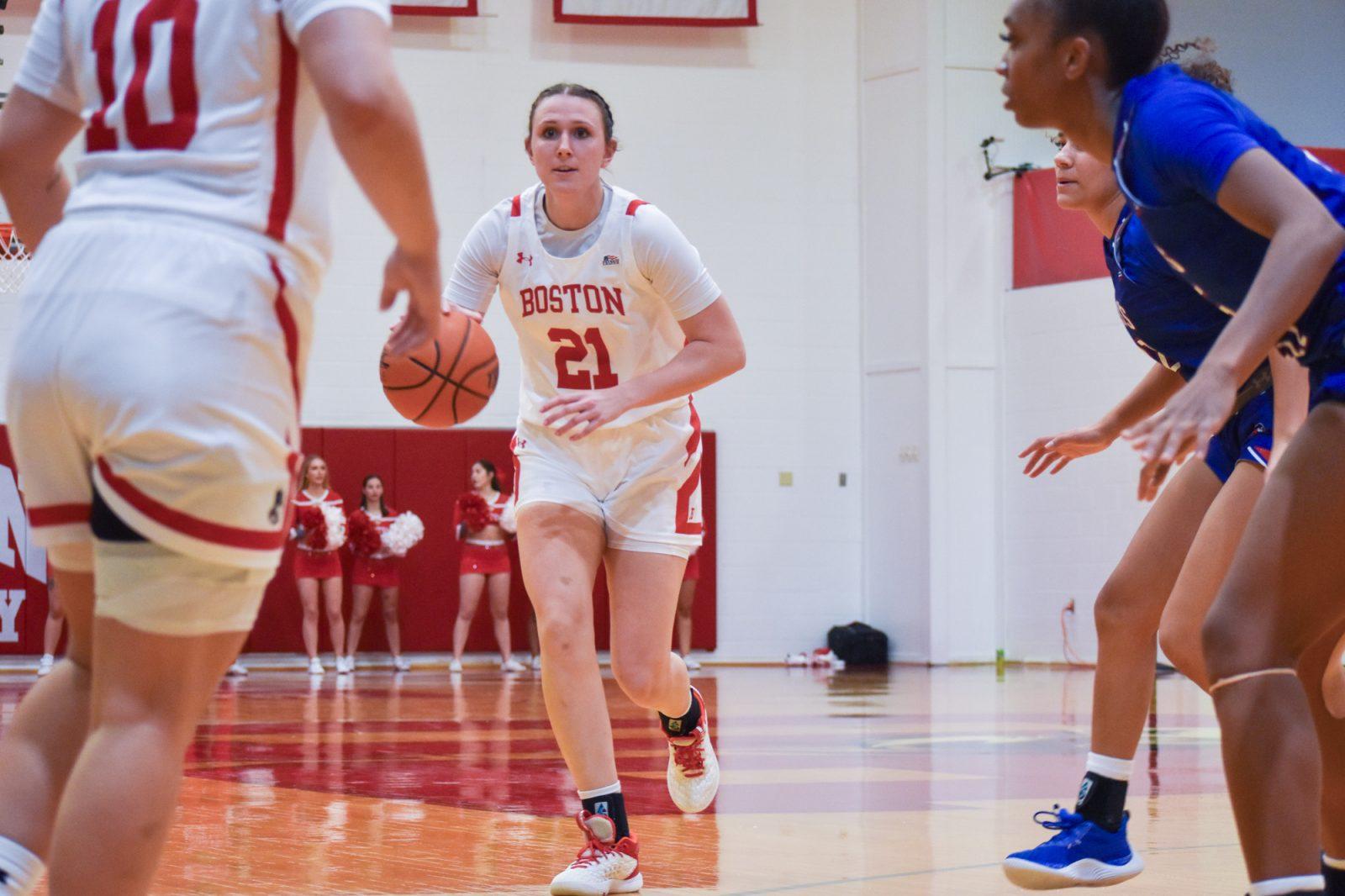 Freshman guard Audrey Erickson (21) dribbles down the court in a game against the University of Massachusetts Lowell last November. The Terriers won 51-39 against Lafayette College on Saturday. KELLY BRODER/DFP PHOTOGRAPHER