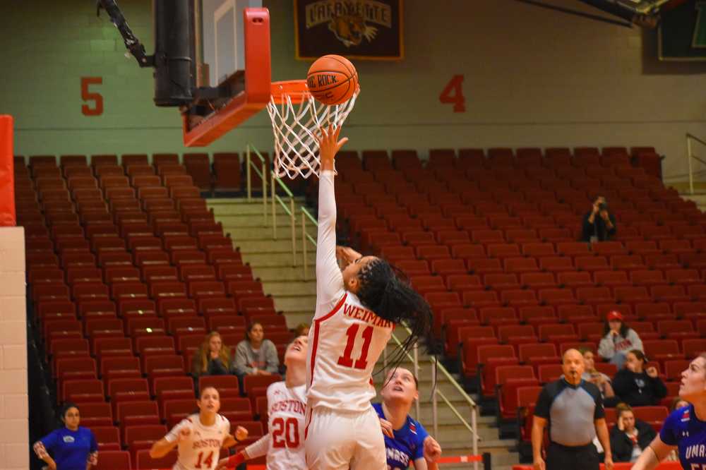 Senior forward Caitlin Weimar shoots a layup.