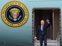 President Biden deplanes Air Force One in Boston Logan International Airport on Tuesday. Biden attended three fundraising events while hundreds downtown protested in response to the events. ANDREW BURKE-STEVENSON/DFP PHOTOGRAPHER
