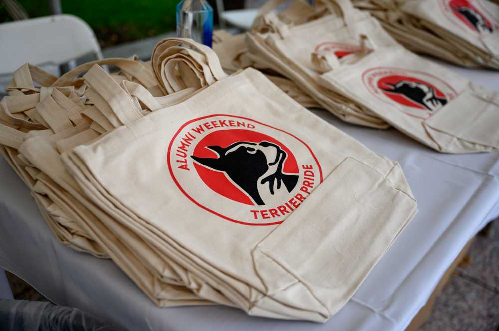 Alumni weekend totes available at the welcome tent. This past weekend celebrated alumni for the first time since COVID-19. ANDREW BURKE-STEVENSON/DFP PHOTOGRAPHER