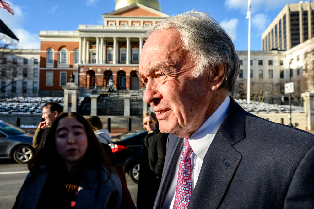 Senator Ed Markey walks past the Massachusetts State House to deliver a speech at the rally.