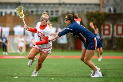 BU women’s lacrosse midfielder Jayne Feeney (7) drives to the goal during a game against Bucknell last Saturday