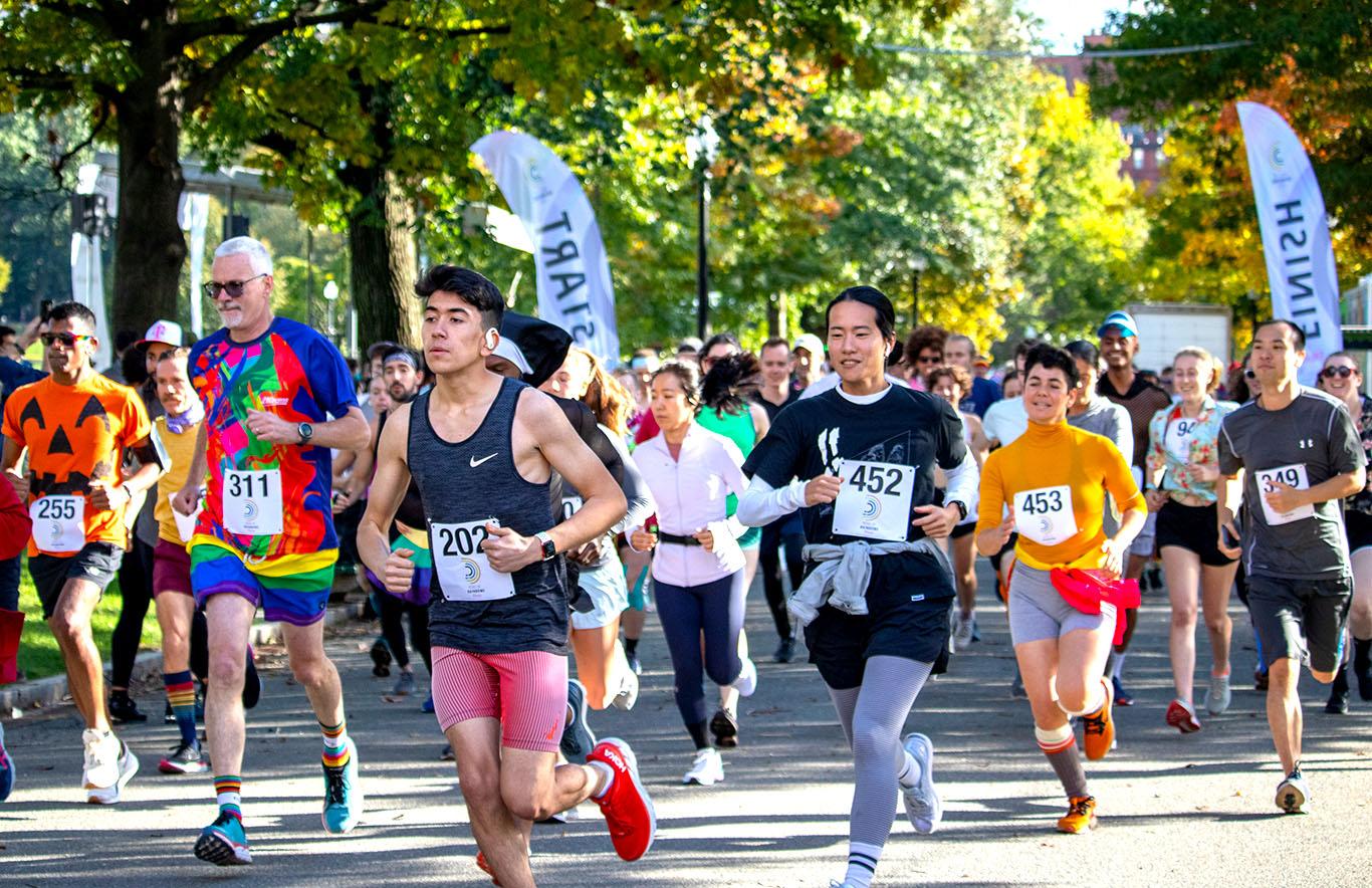 Runners in Boston's first all-inclusive LGBTQ+ 5K race Sunday at the Boston Common. The Boston Theater Company put on the now inaugural race through for its newest wing, the Artist Athletic Association. TAYLOR COESTER/ DAILY FREE PRESS STAFF
