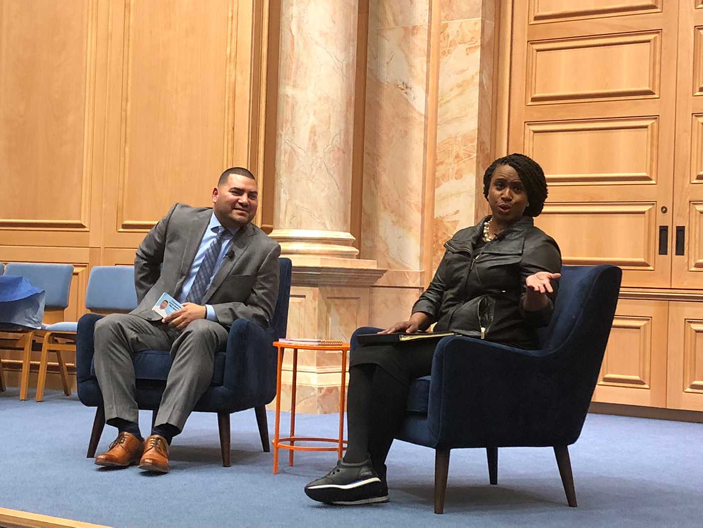 U.S. Representative Ayanna Pressley and Raul Fernandez speaking about race and equality on April 23 at the Congregation Kehillath Israel. 
COURTESY OF LAURA BRADFORD
