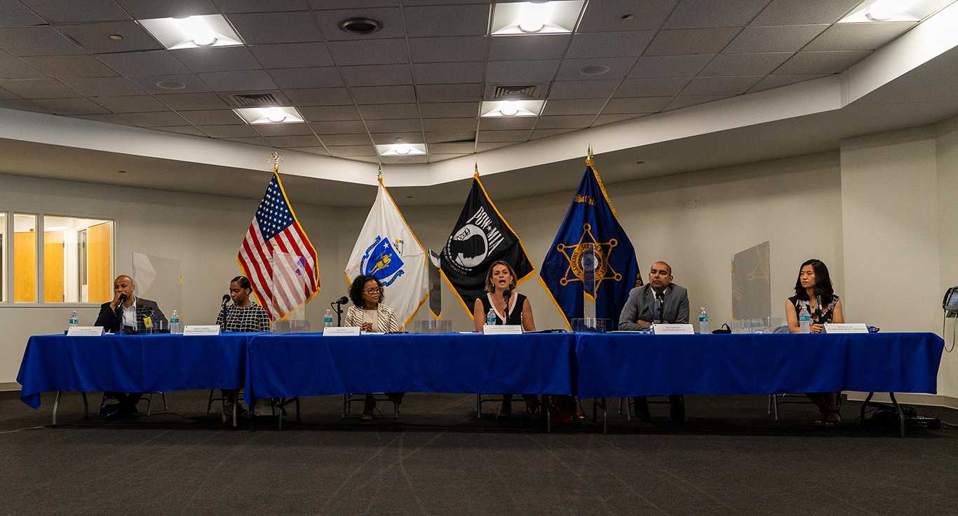 Boston mayoral candidates John Barros, Andrea Campbell, Kim Janey, Annissa Essaibi George, Jon Santiago and Michelle Wu at the Suffolk County House of Corrections May 28. The candidates addressed criminal justice reform, mental health resources and more at their first in-person mayoral forum. COURTESY OF PETER VAN DELFT