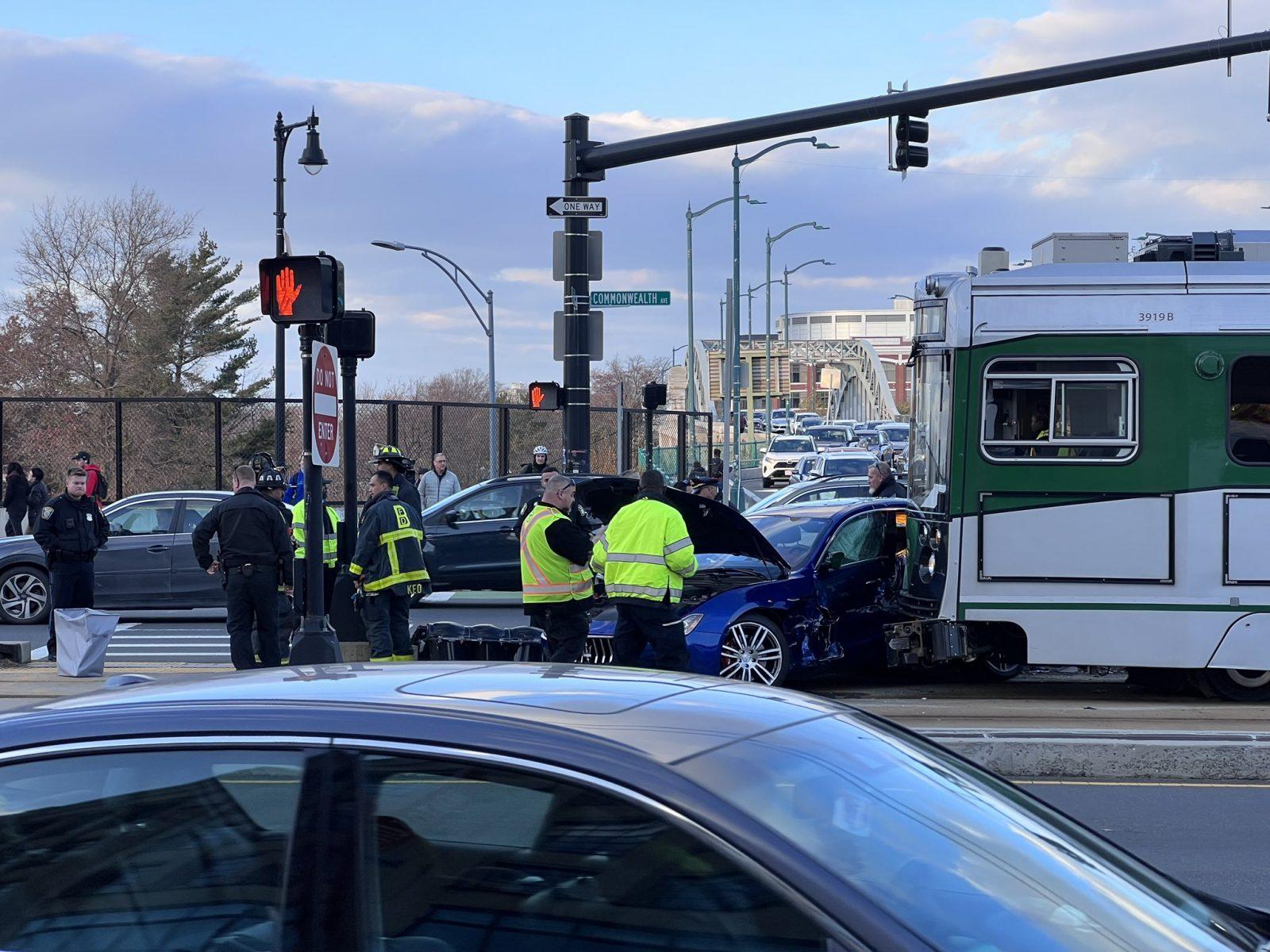 The Green Line crashing into a car at the intersection in front of the Boston University Bridge and Comm Ave. COURTESY OF JONATHAN MESSER VIA TWITTER
