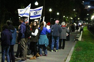 Protesters stand together in a human chain in Boston Common