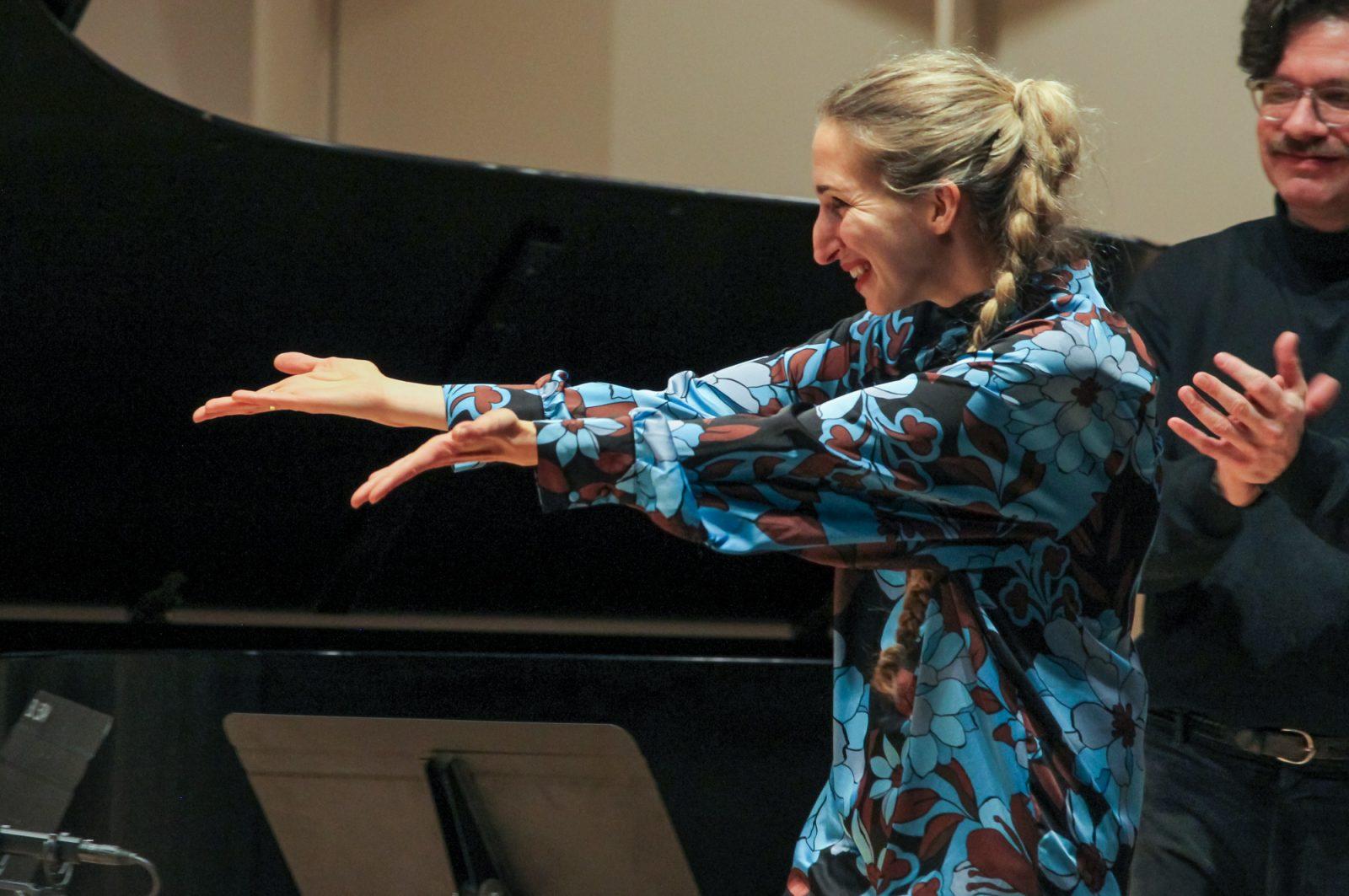 Sarah Nemtsov gestures to her orchestra during a performance on Jan. 31. Nemtsov is currently the College of Fine Arts’ composer in residence. SARAH CRUZ/DFP PHOTOGRAPHER 
