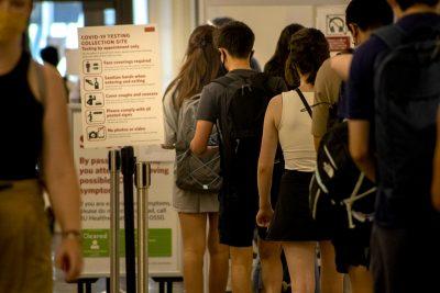 students in line for COVID testing