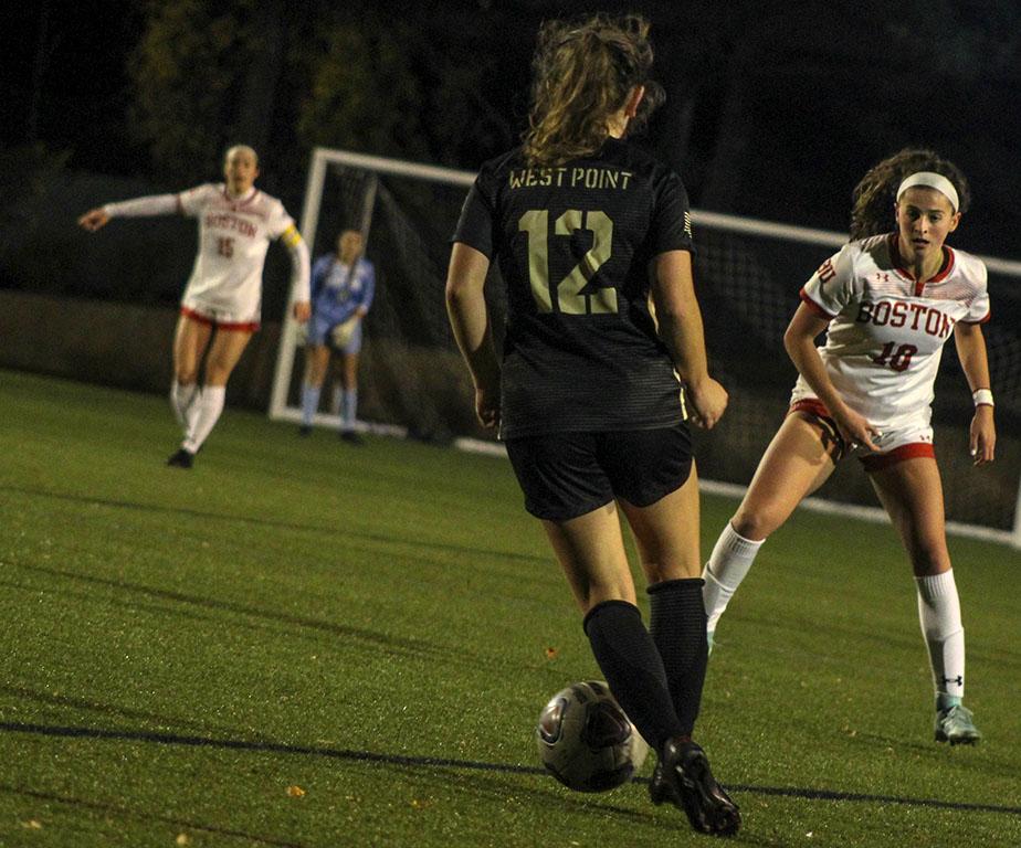 Sophomore forward Abigail McNulty faces Army West Point’s Andrea Riddle in a match Thursday night. The Terriers won 1-0, advancing to the Patriot League final. SHANNON DAMIANO/ DAILY FREE PRESS STAFF
