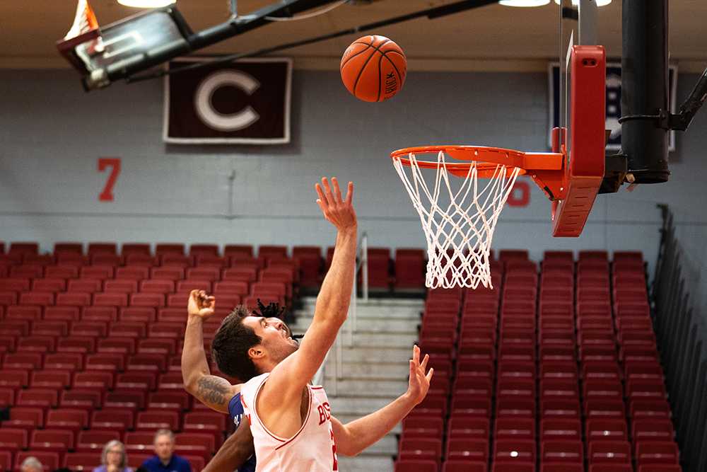 Boston University senior forward Nevin Zink shoots a layup during a Feb. 1 game. BU fell to Army 71-69 in overtime of the Patriot League quarterfinals. DANNY DOLAN/DFP FILE