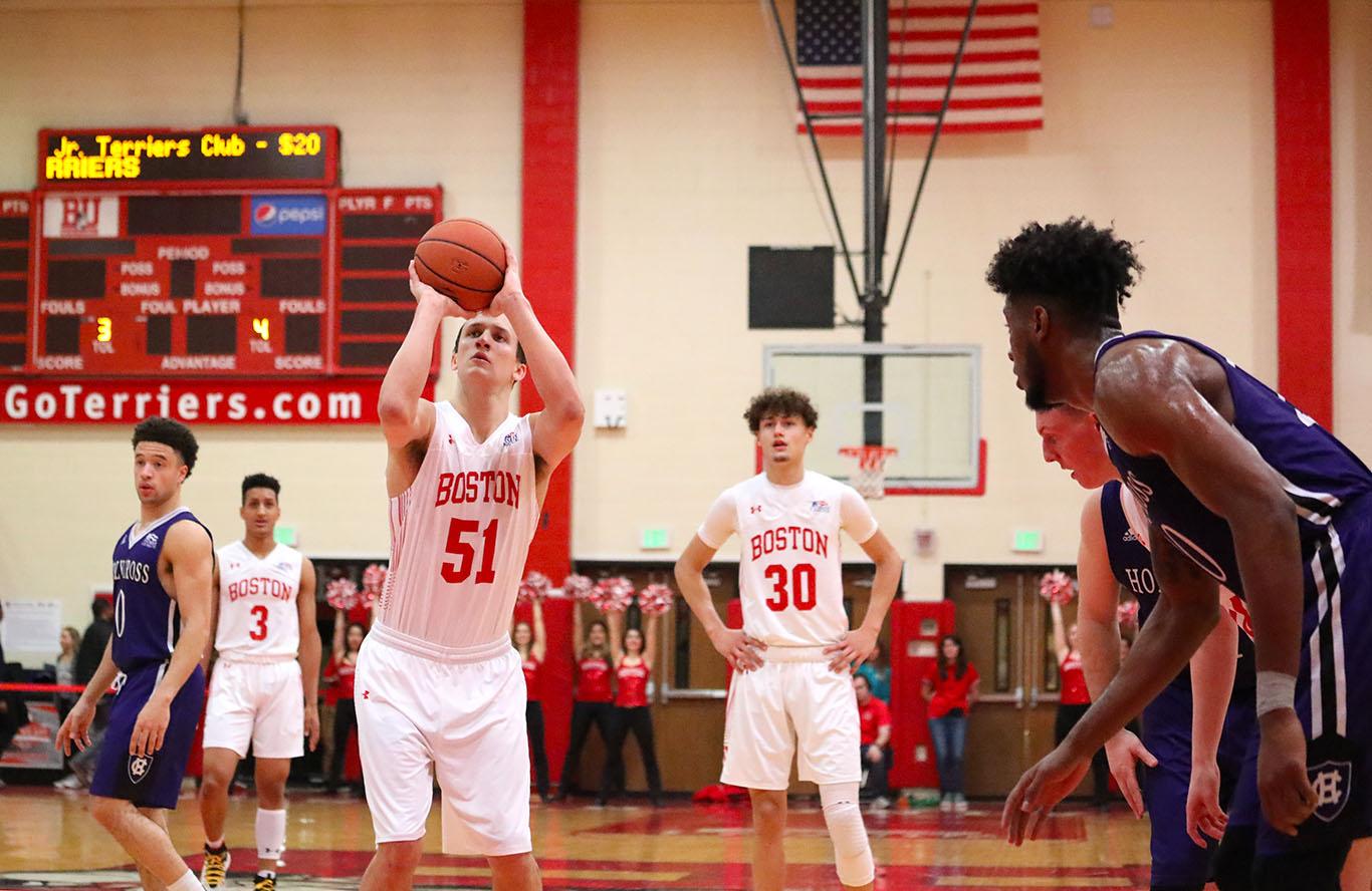 Boston University men’s basketball in a game against the College of the Holy Cross Jan. 30, 2019. After a challenging year adhering to COVID-19 policies, the Terriers are ready to work on surpassing their 2020 performance. MADDIE EPPERSON/ DFP FILE
